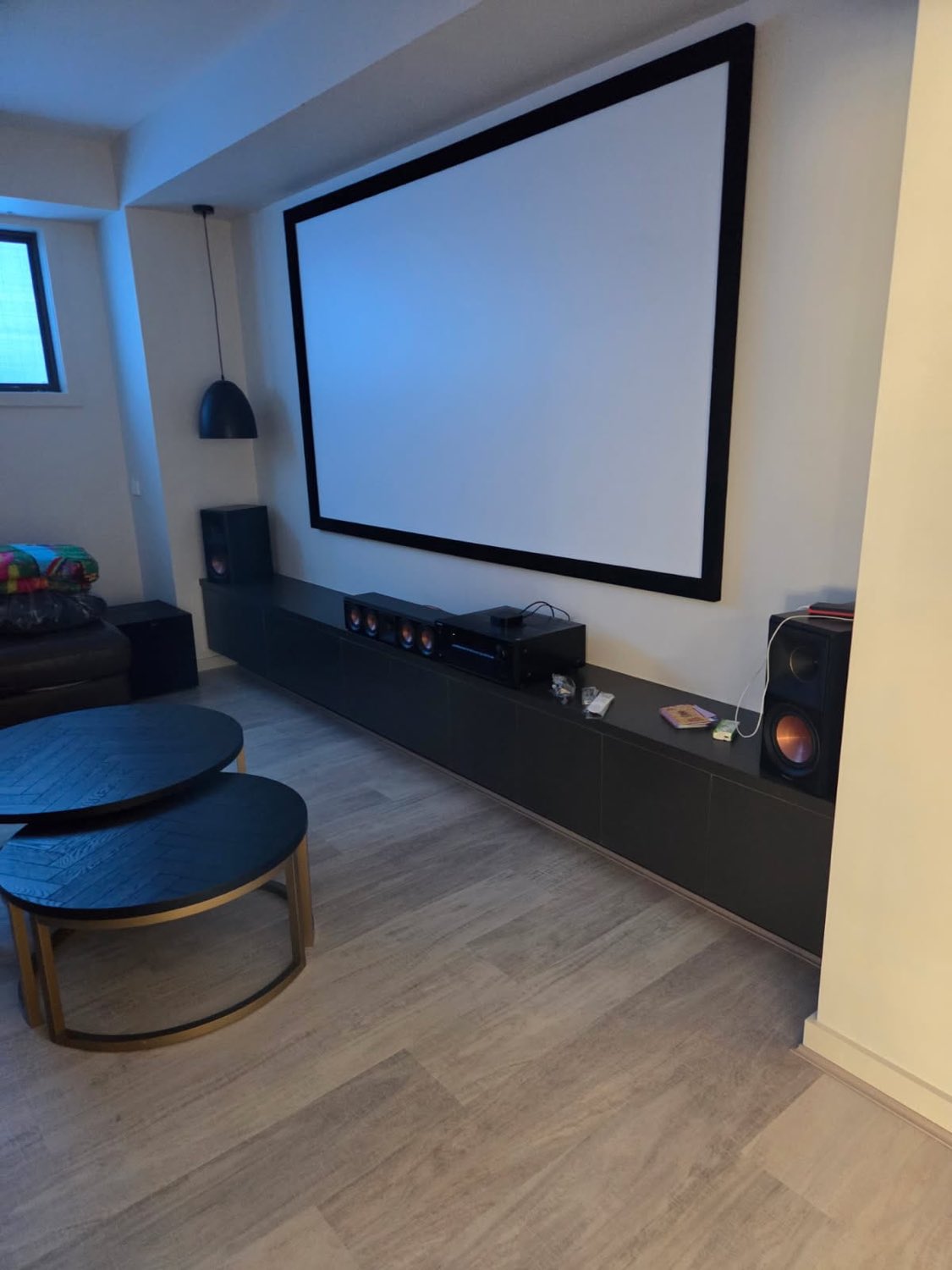 Home theatre with black media cabinetry