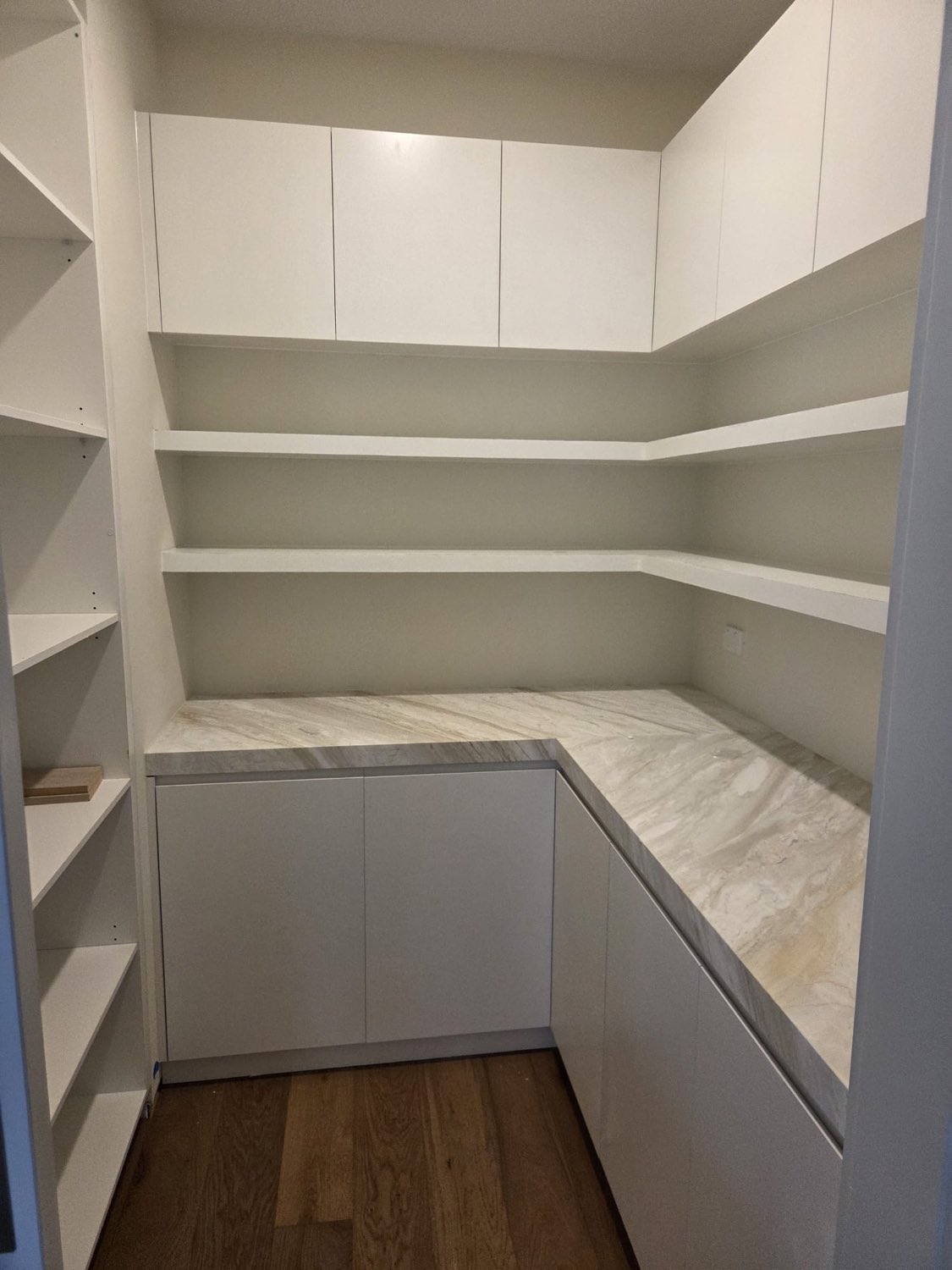 White butler's pantry with marble benchtop
