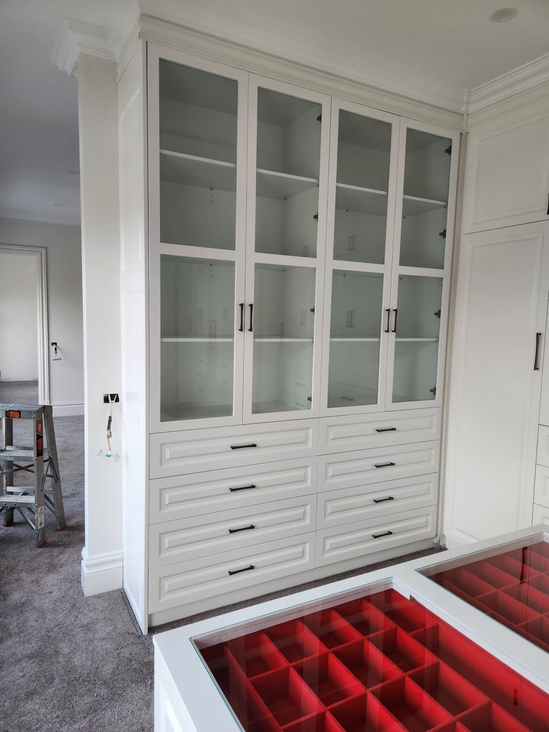 White wardrobe with glass display cabinetry