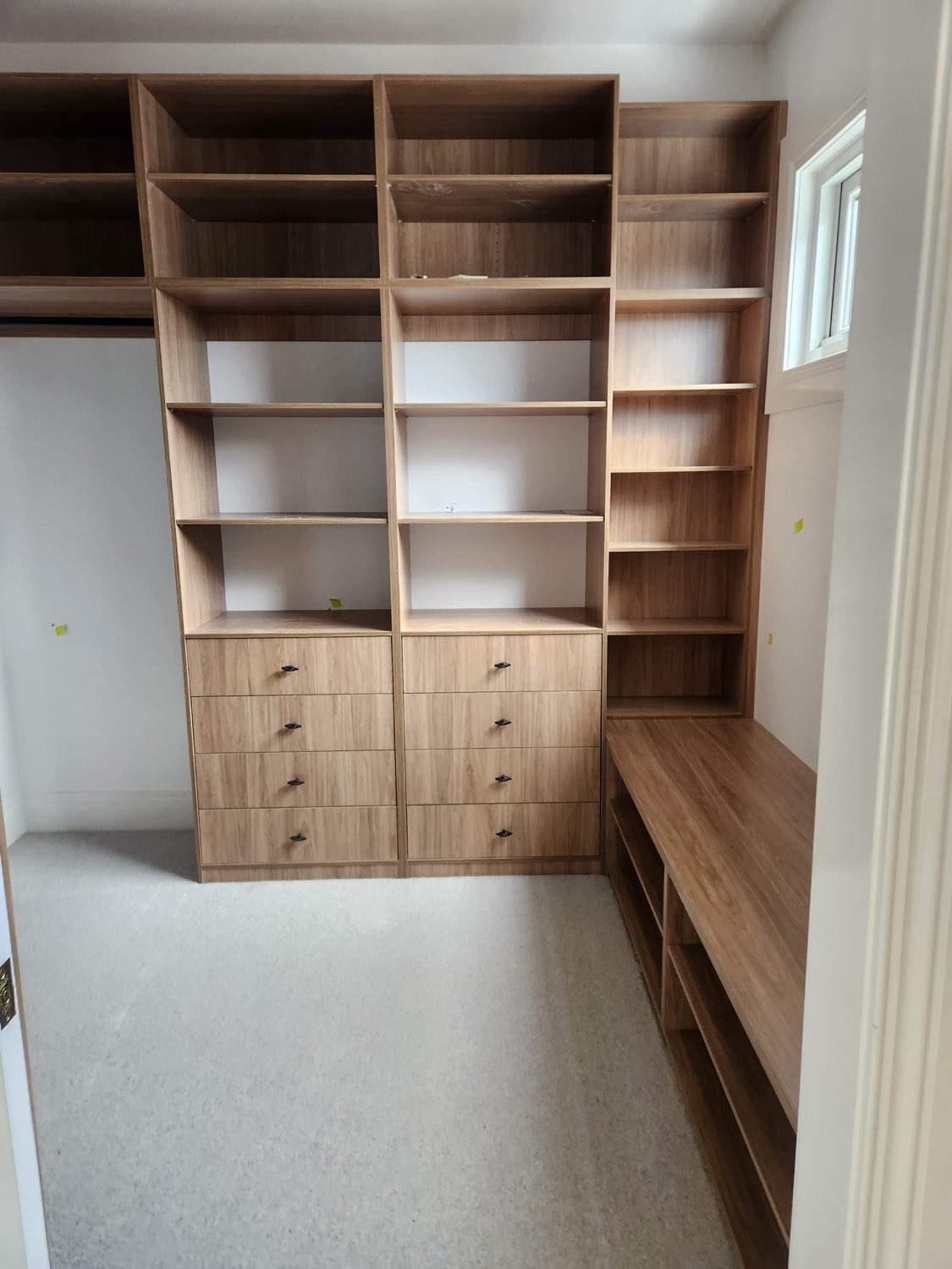 Oak walk-in wardrobe with drawers and shelving
