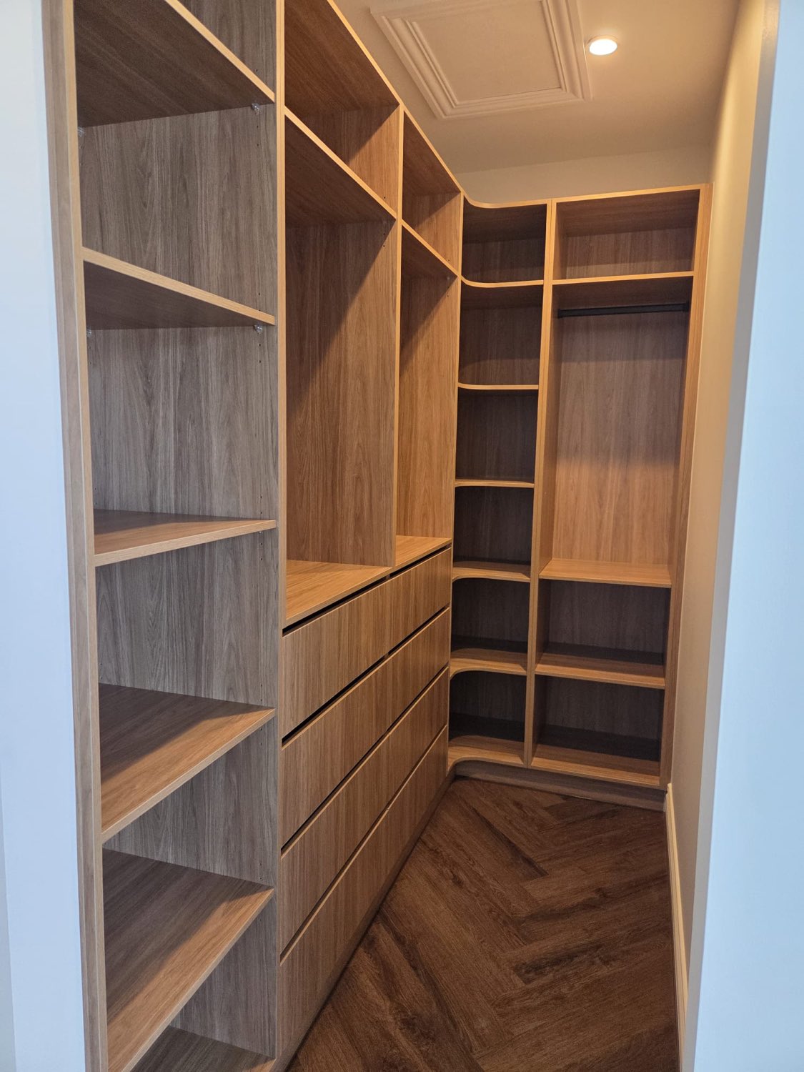 Timber corner wardrobe shelving